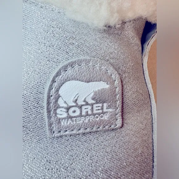 SOREL x Disney Frozen “Out N About” bootie boots silver shearling white warm