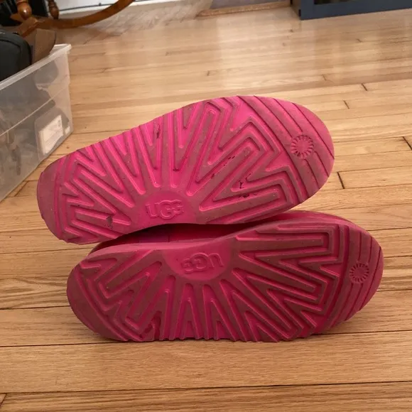 Ugg brand rain/winter boots, worn about 3 x. Hot pink size 6Y